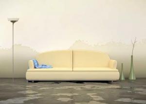 A sofa surrounded by water